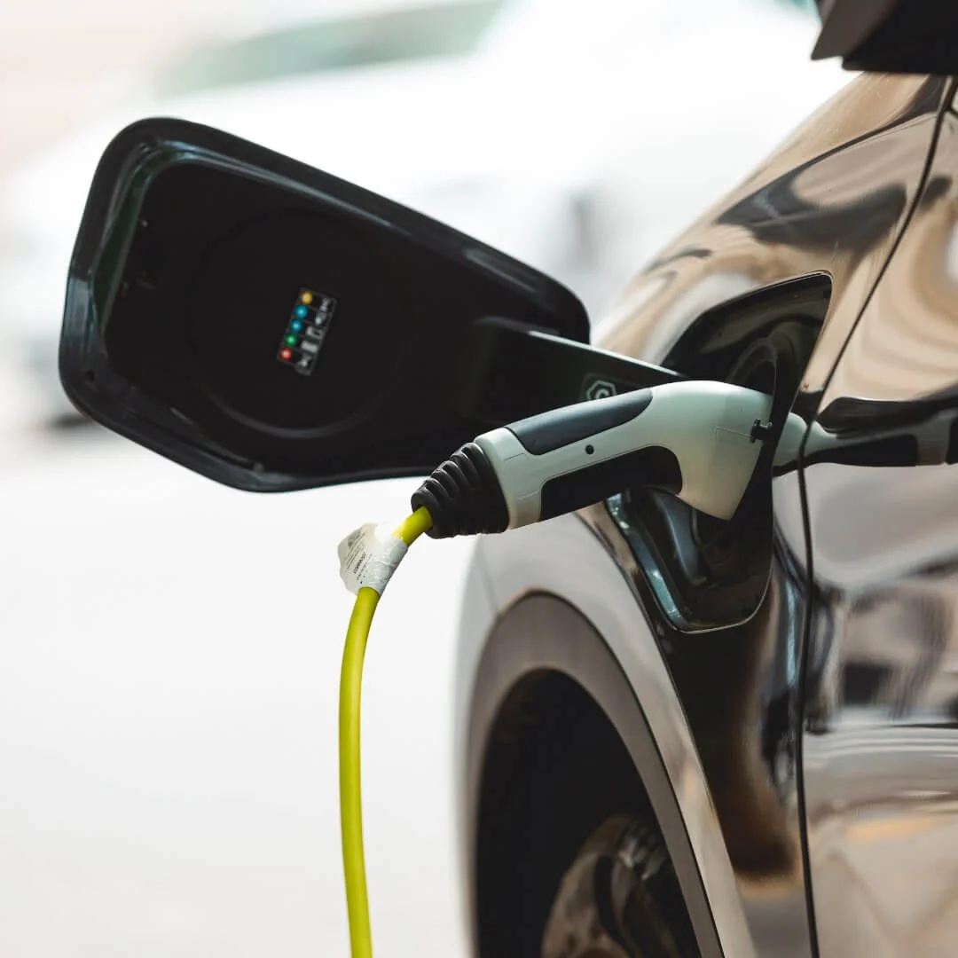 Electric car plugged in and charging